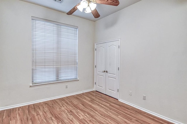 3900 Irvine Dr, Norman, OK 73072 - unfurnished room featuring light wood-style flooring and ceiling fan