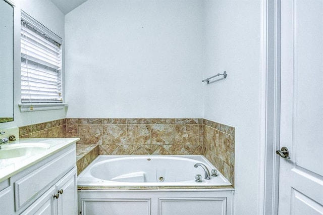 3900 Irvine Dr, Norman, OK 73072 - bathroom featuring a jetted tub and vanity