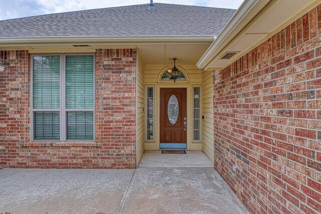 3900 Irvine Dr, Norman, OK 73072 - entrance to property with brick siding and roof with shingles