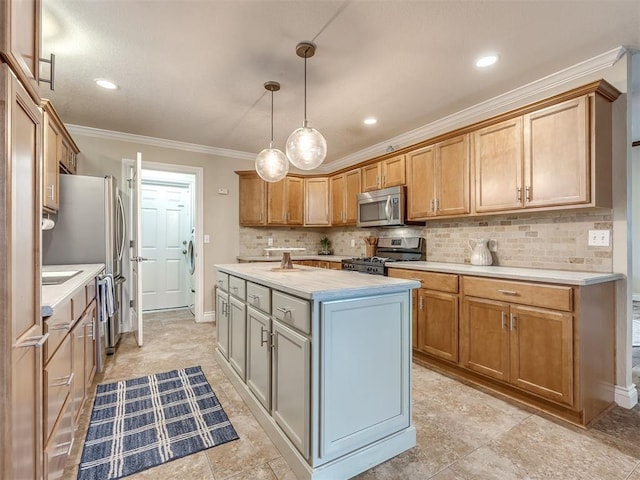 17213 Sunny Hollow Rd, Edmond, OK 73012 - kitchen with stainless steel appliances, light countertops, a center island, tasteful backsplash, and ornamental molding
