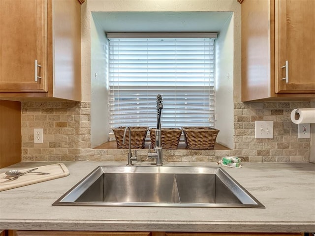 17213 Sunny Hollow Rd, Edmond, OK 73012 - kitchen view of decorative backsplash, light countertops, and brown cabinets