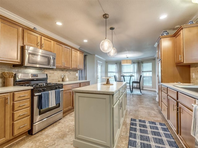 17213 Sunny Hollow Rd, Edmond, OK 73012 - kitchen featuring stainless steel appliances, a center island, ornamental molding, light countertops, and tasteful backsplash