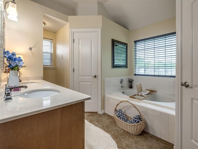 17213 Sunny Hollow Rd, Edmond, OK 73012 - full bath featuring a bath, tile patterned floors, double vanity, and lofted ceiling