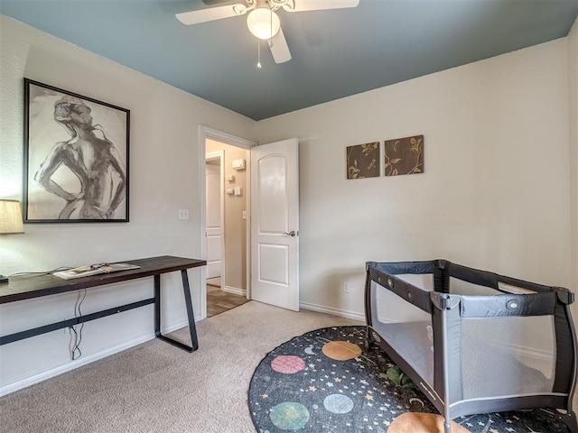 17213 Sunny Hollow Rd, Edmond, OK 73012 - carpeted bedroom featuring baseboards and ceiling fan
