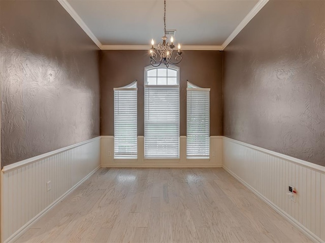 3716 Equestrian Ct, Edmond, OK 73034 - unfurnished room featuring a chandelier, wood finished floors, and ornamental molding