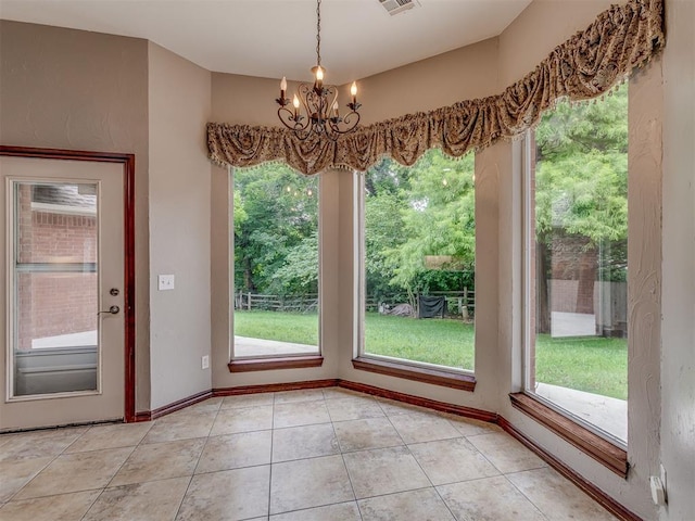 3716 Equestrian Ct, Edmond, OK 73034 - unfurnished dining area featuring a chandelier and light tile patterned floors