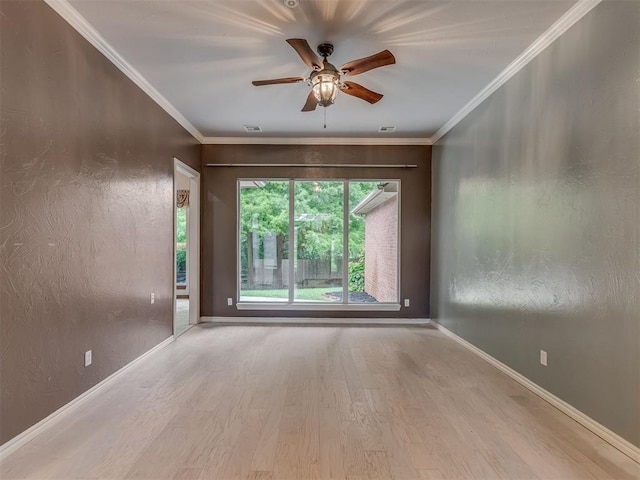 3716 Equestrian Ct, Edmond, OK 73034 - spare room featuring wood finished floors, a ceiling fan, and ornamental molding