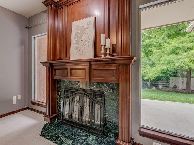 3716 Equestrian Ct, Edmond, OK 73034 - detailed view of a premium fireplace and baseboards