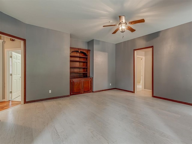 3716 Equestrian Ct, Edmond, OK 73034 - spare room with a ceiling fan and light wood-style flooring