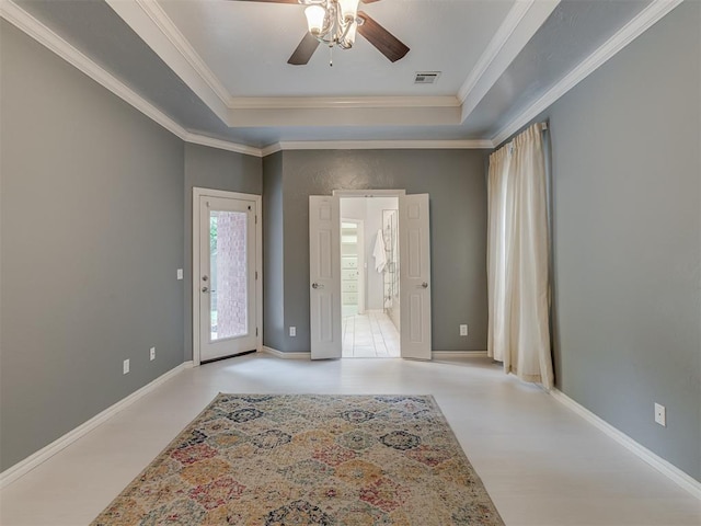 3716 Equestrian Ct, Edmond, OK 73034 - empty room with a raised ceiling, ceiling fan, and crown molding