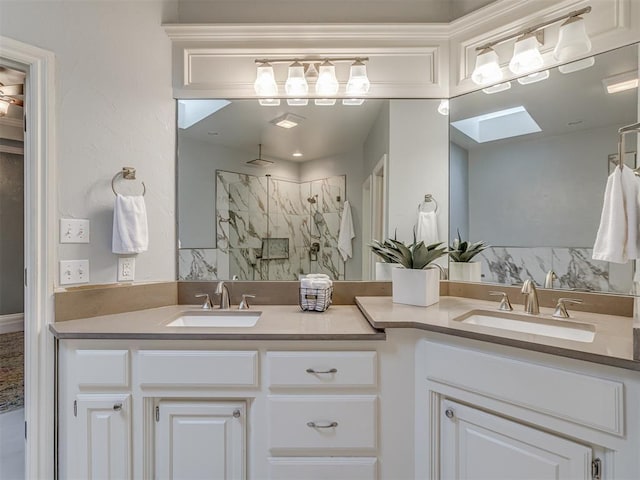 3716 Equestrian Ct, Edmond, OK 73034 - full bathroom with a marble finish shower, double vanity, and a skylight