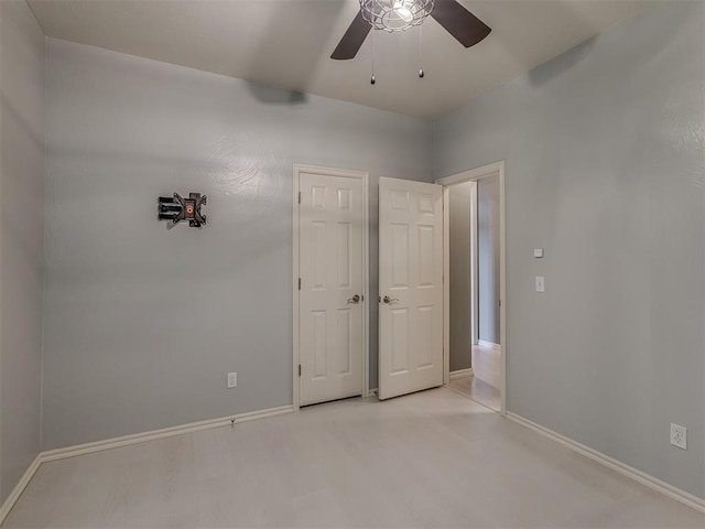 3716 Equestrian Ct, Edmond, OK 73034 - unfurnished bedroom with baseboards and ceiling fan