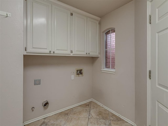 3716 Equestrian Ct, Edmond, OK 73034 - washroom with washer hookup, gas dryer hookup, cabinet space, light tile patterned floors, and hookup for an electric dryer