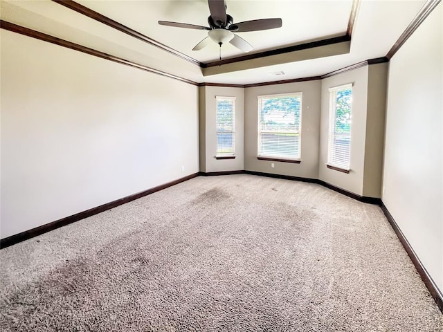 2010 Lakewood, Seminole, OK 74868 - spare room with light carpet, a raised ceiling, crown molding, and a ceiling fan