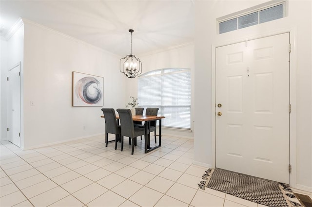 14213 Pecan Hollow Ter, Edmond, OK 73013 - dining space with ornamental molding, a chandelier, and light tile patterned floors