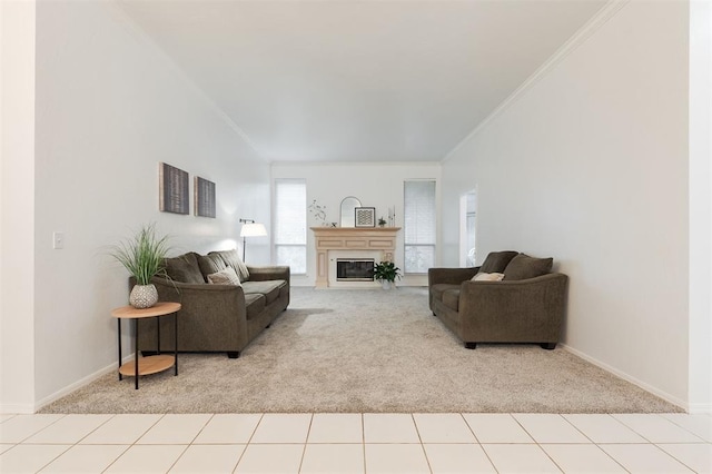 14213 Pecan Hollow Ter, Edmond, OK 73013 - carpeted living area featuring crown molding and a glass covered fireplace