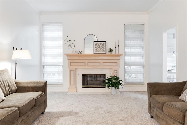 14213 Pecan Hollow Ter, Edmond, OK 73013 - carpeted living room featuring ornamental molding and a fireplace with flush hearth