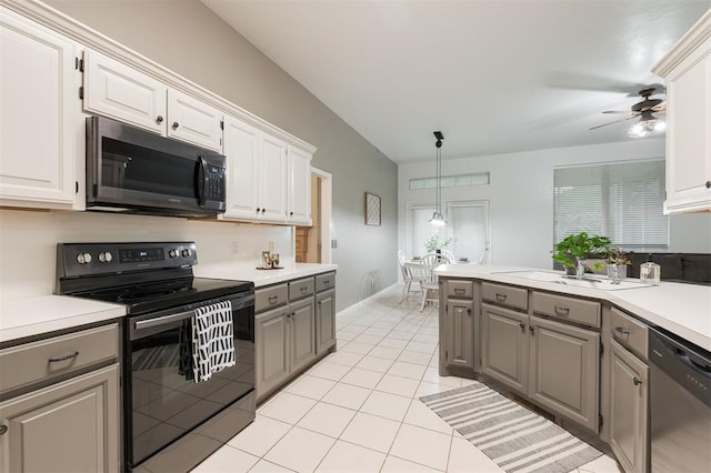 14213 Pecan Hollow Ter, Edmond, OK 73013 - kitchen with electric range, gray cabinetry, dishwasher, ceiling fan, and light countertops