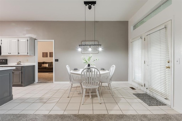 14213 Pecan Hollow Ter, Edmond, OK 73013 - dining space with light tile patterned flooring and baseboards