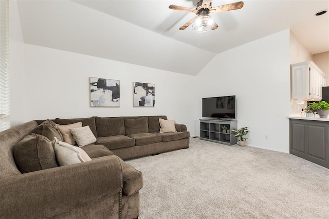 14213 Pecan Hollow Ter, Edmond, OK 73013 - carpeted living area with vaulted ceiling and ceiling fan