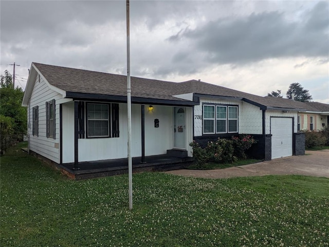 733 E Steed Dr, Midwest City, OK 73110 - single story home with a garage, a front yard, and covered porch