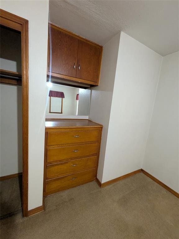 733 E Steed Dr, Midwest City, OK 73110 - unfurnished bedroom featuring light colored carpet and a closet