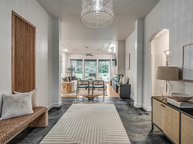 3604 Valley Creek Cir, Edmond, OK 73034 - living room featuring arched walkways and ceiling fan