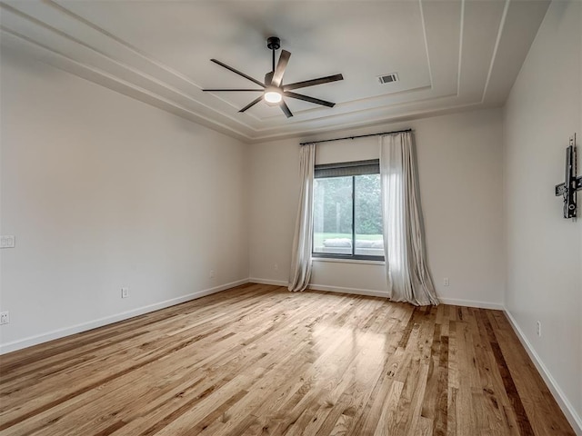 3604 Valley Creek Cir, Edmond, OK 73034 - spare room featuring a ceiling fan and wood finished floors