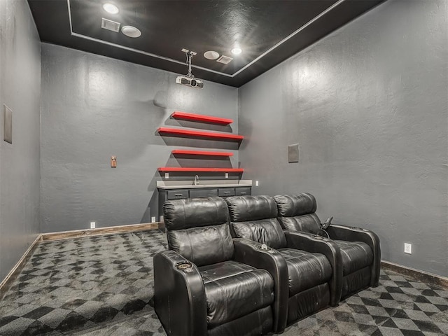 3604 Valley Creek Cir, Edmond, OK 73034 - cinema room featuring carpet floors and a textured wall