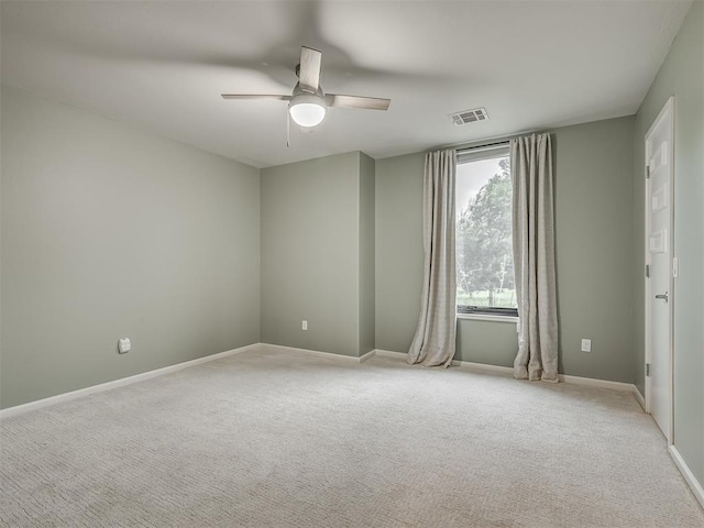 3604 Valley Creek Cir, Edmond, OK 73034 - empty room with a ceiling fan and light carpet