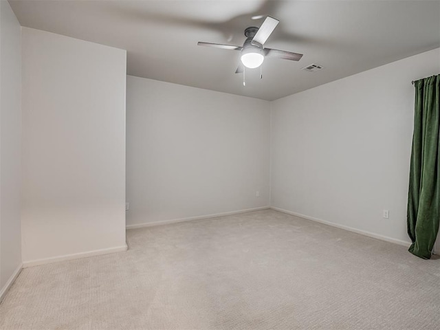 3604 Valley Creek Cir, Edmond, OK 73034 - spare room featuring carpet flooring and ceiling fan