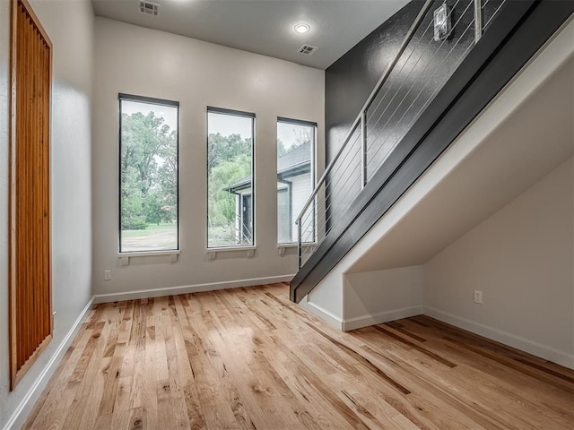 3604 Valley Creek Cir, Edmond, OK 73034 - bonus room with wood finished floors and stairway