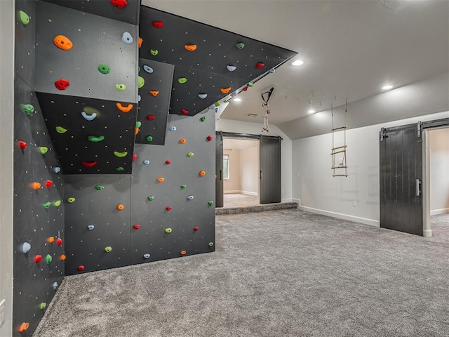 3604 Valley Creek Cir, Edmond, OK 73034 - game room featuring a barn door, carpet floors, and recessed lighting