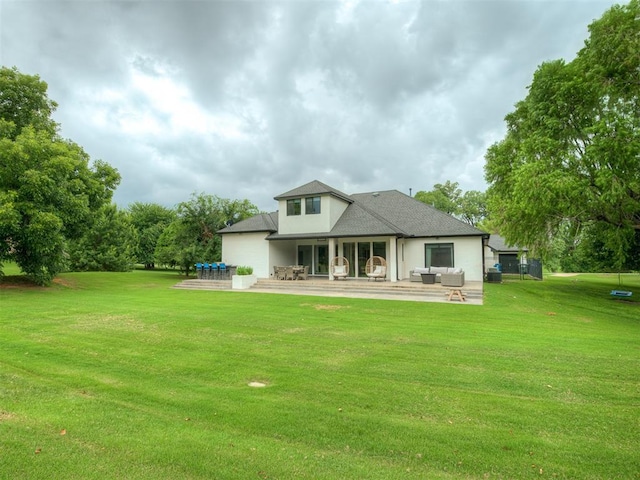 3604 Valley Creek Cir, Edmond, OK 73034 - back of house with an outdoor hangout area, a patio area, and a yard
