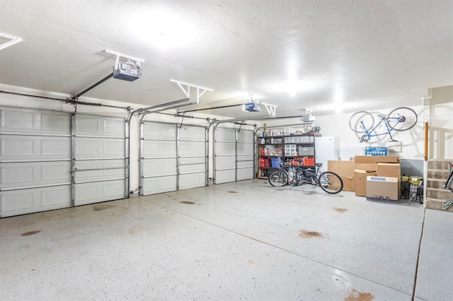 2525 Steeplechase Rd, Edmond, OK 73034 - garage with a garage door opener