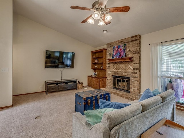 3213 Creekwood Ct, Norman, OK 73072 - living room featuring carpet, a ceiling fan, lofted ceiling, and a fireplace