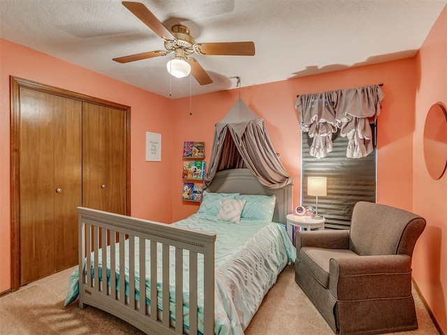3213 Creekwood Ct, Norman, OK 73072 - carpeted bedroom with a closet and a ceiling fan