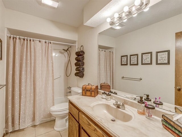 3213 Creekwood Ct, Norman, OK 73072 - bathroom featuring tile patterned floors, vanity, and shower / tub combo