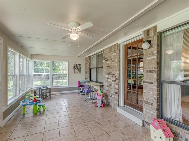 3213 Creekwood Ct, Norman, OK 73072 - unfurnished sunroom with a ceiling fan