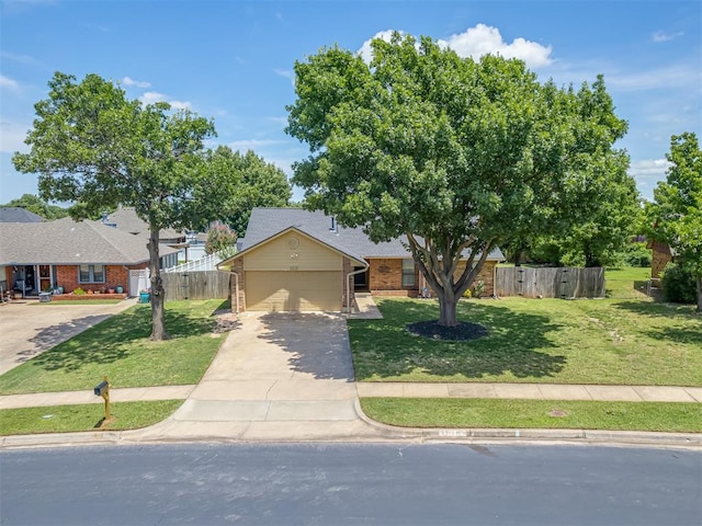 3213 Creekwood Ct, Norman, OK 73072 - view of front facade featuring a garage, brick siding, and driveway