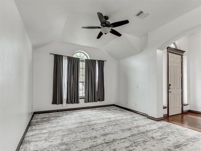 18501 El Greco Dr, Edmond, OK 73012 - bonus room with wood finished floors, arched walkways, ceiling fan, and lofted ceiling