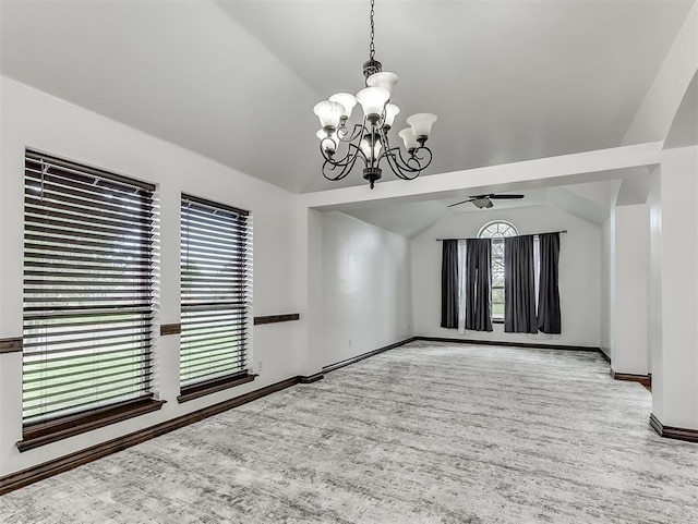 18501 El Greco Dr, Edmond, OK 73012 - empty room featuring ceiling fan, vaulted ceiling, wood finished floors, and a chandelier
