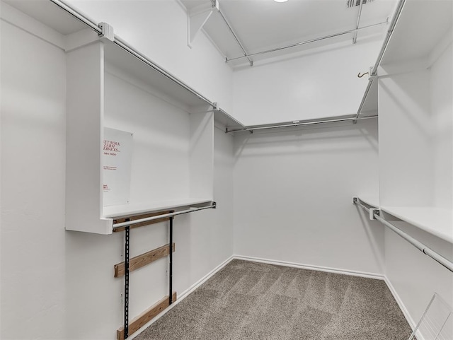18501 El Greco Dr, Edmond, OK 73012 - walk in closet featuring carpet floors