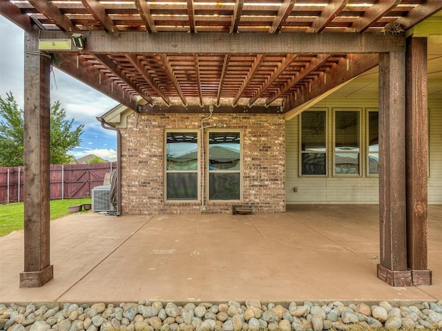 18501 El Greco Dr, Edmond, OK 73012 - view of patio / terrace featuring a pergola