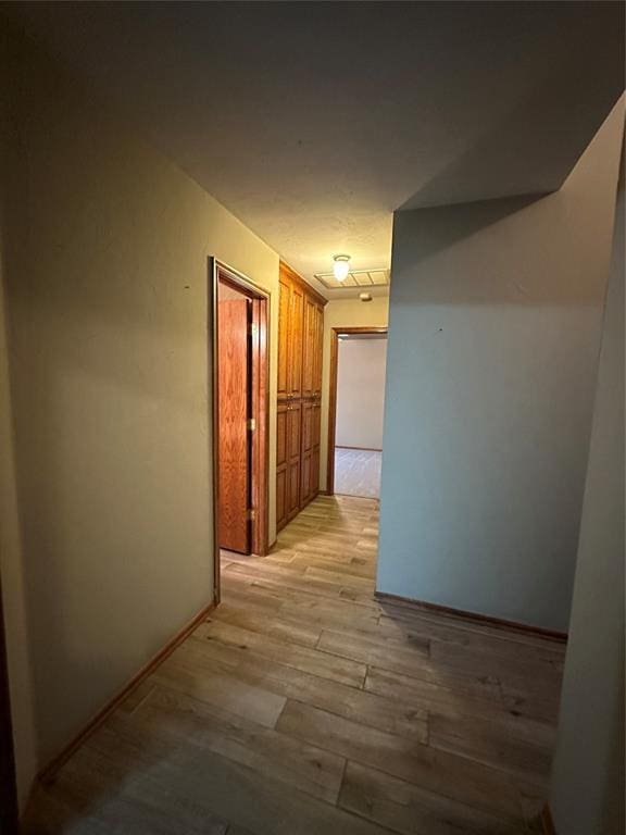 712 N Cherokee Way, Mustang, OK 73064 - hall featuring light wood-style flooring