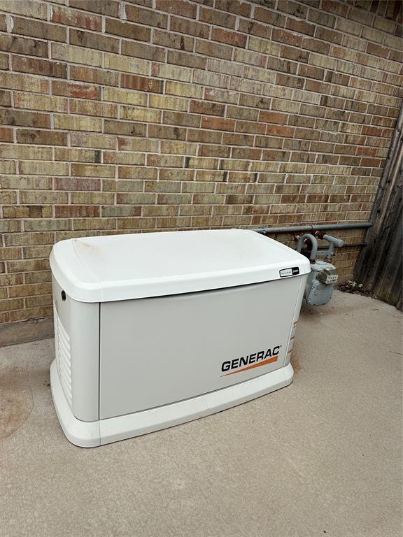 712 N Cherokee Way, Mustang, OK 73064 - exterior view of a power unit and gas meter