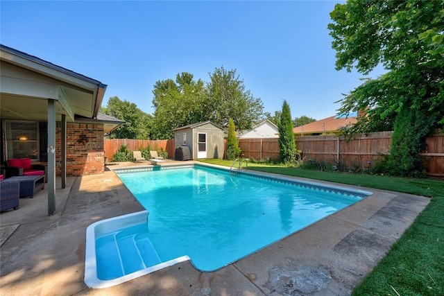1040 Mabel C Fry Blvd, Yukon, OK 73099 - view of pool with a fenced backyard, a patio, a storage unit, and a diving board