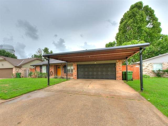 1040 Mabel C Fry Blvd, Yukon, OK 73099 - view of front of property with a carport, brick siding, and concrete driveway