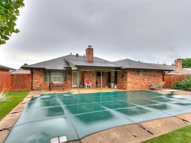 1040 Mabel C Fry Blvd, Yukon, OK 73099 - view of swimming pool with a diving board and a patio area