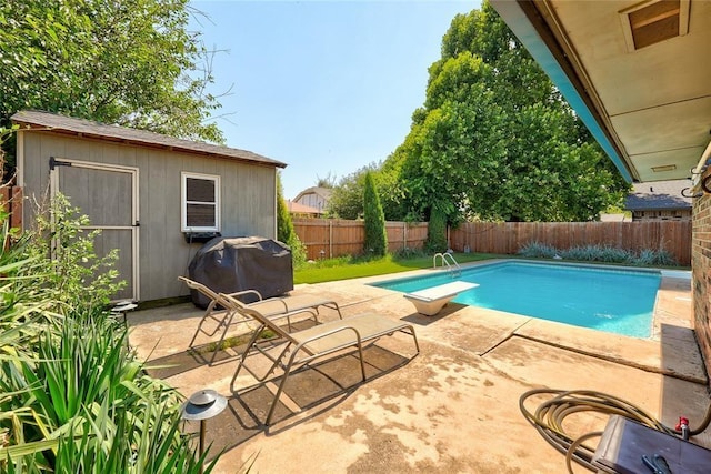 1040 Mabel C Fry Blvd, Yukon, OK 73099 - view of pool with grilling area, a fenced backyard, a patio area, and an outdoor structure